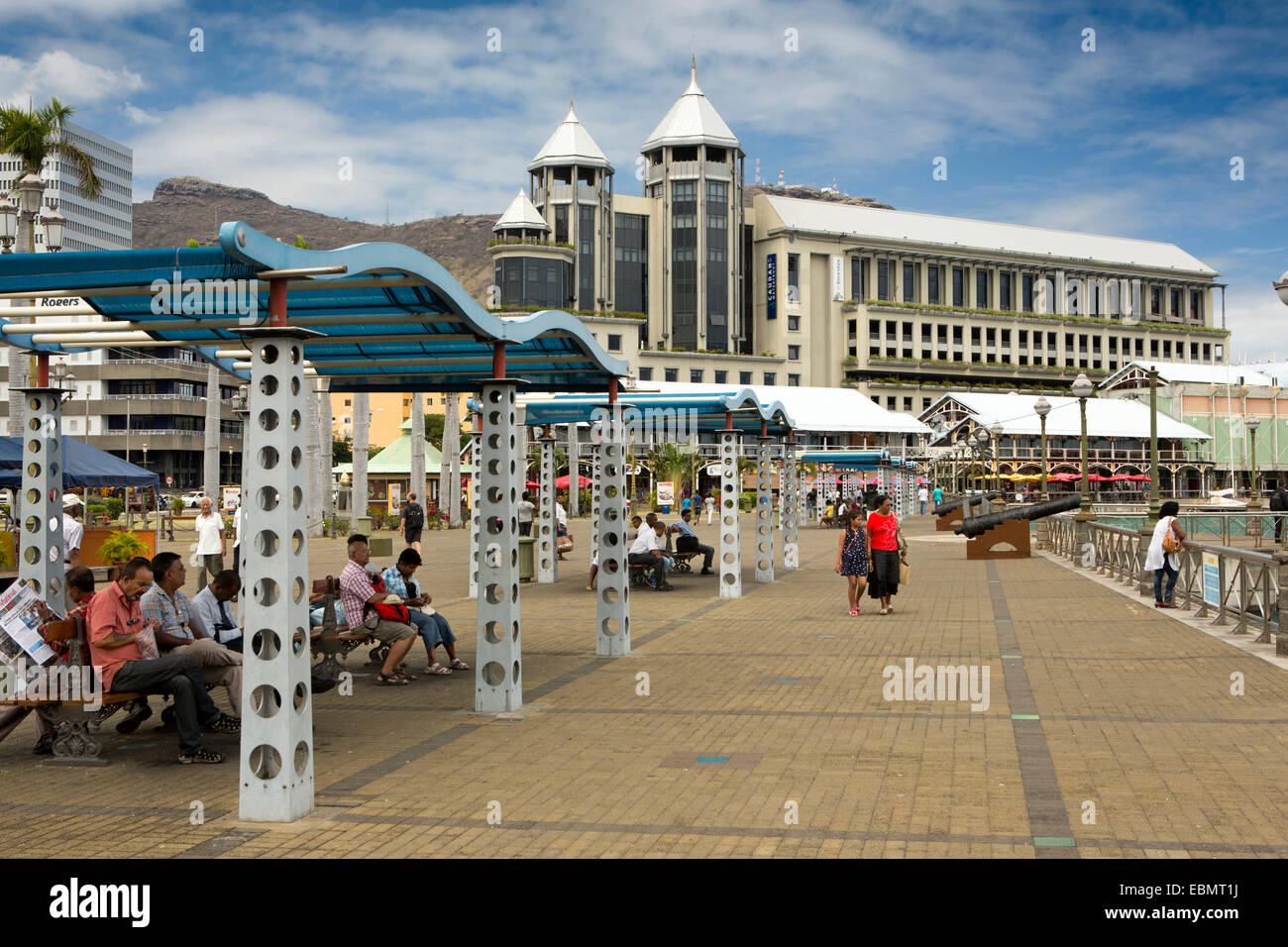 Mauritius, Port Louis, Caudon Waterfront, people on seafront promenade Stock Photo