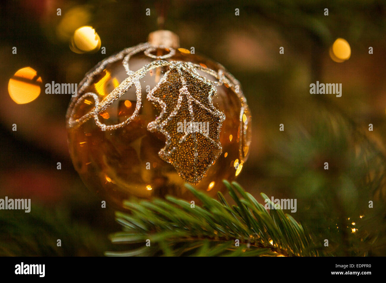 Gold Christmas tree bauble Stock Photo