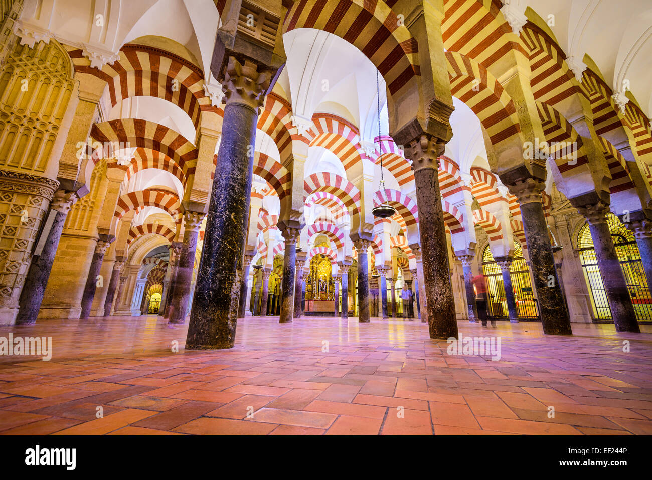 Hypostyle Hall in the Mosque-Cathedral of Cordoba. The site has a rich religious history and is currently an active cathedral. Stock Photo