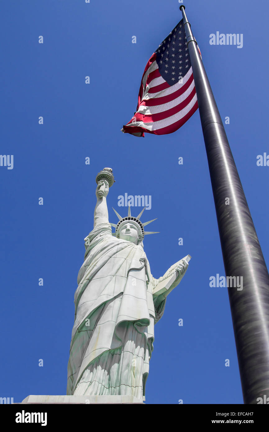 Statue of liberty with American flag Stock Photo