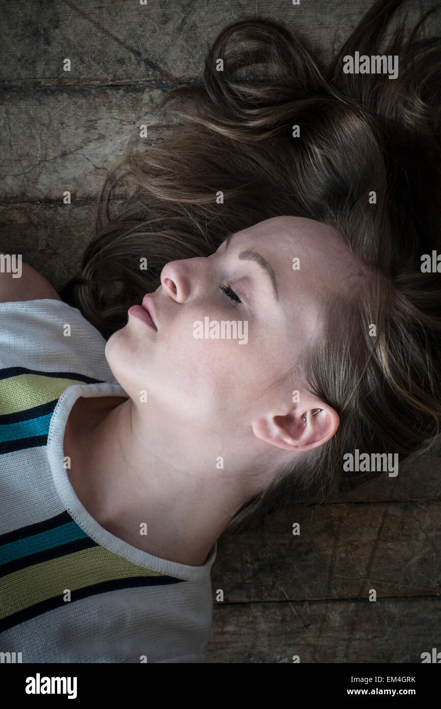 Dead woman on the floor Stock Photo