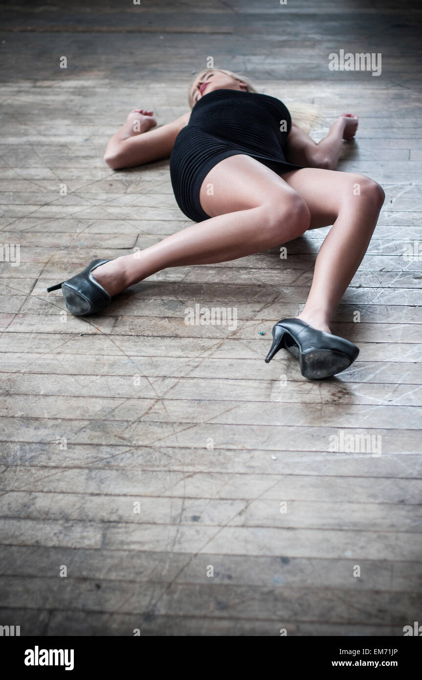 Dead woman on the floor Stock Photo