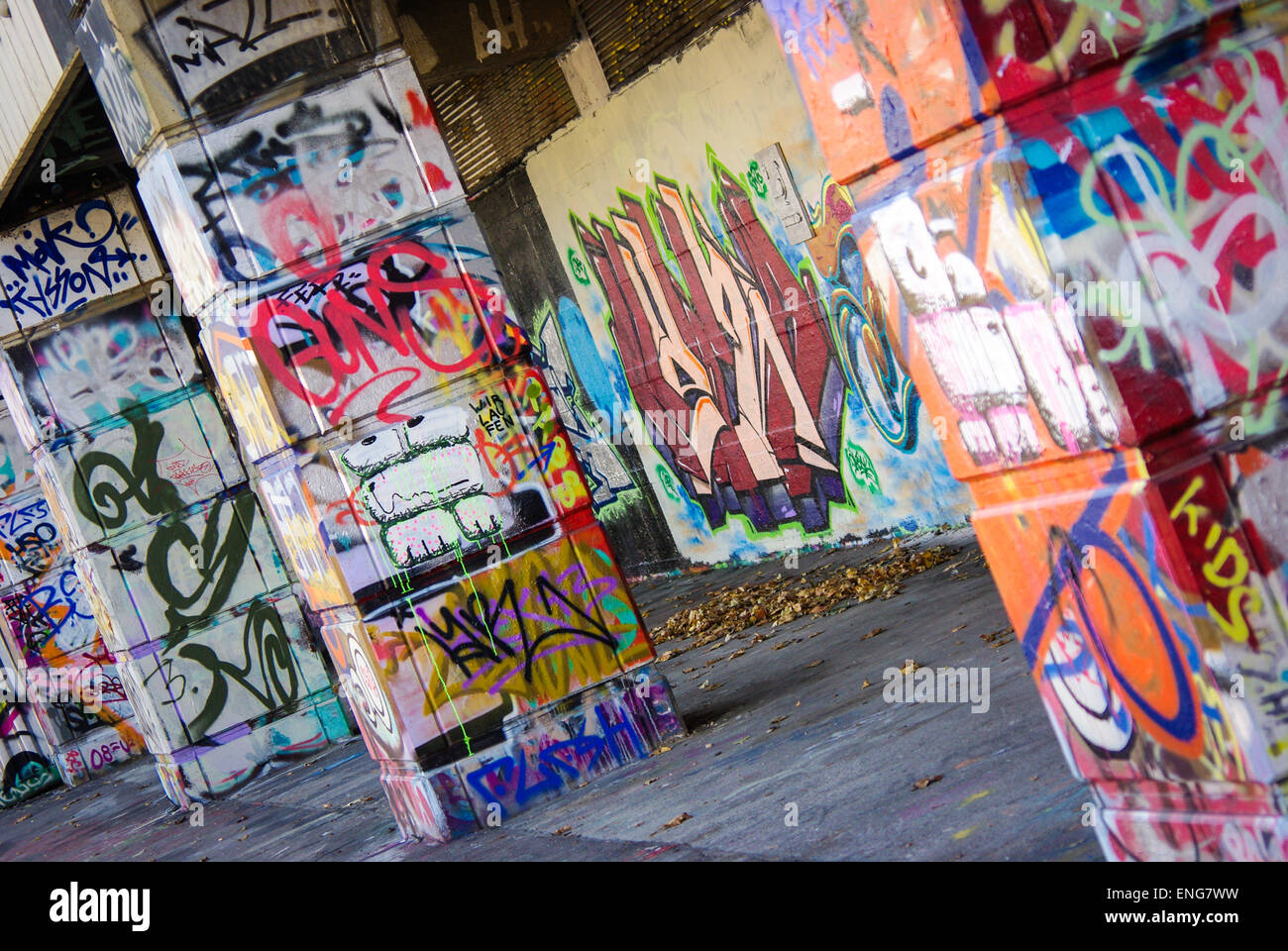 Graffiti on pillars, underpass street art Stock Photo