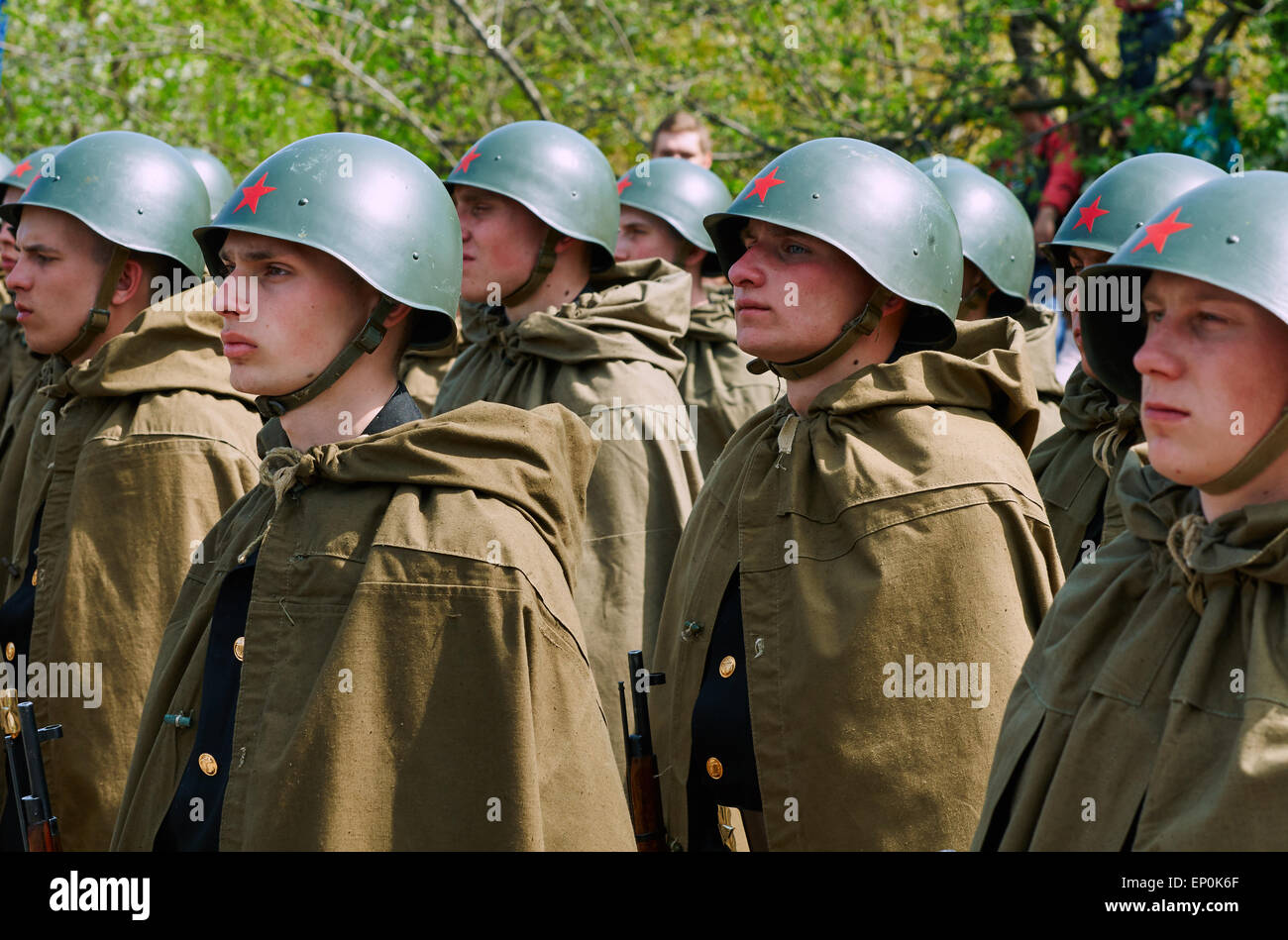 Celebrating the 70th anniversary of the Victory Day (WWII), Soviet soldiers in helmets and cloaks Stock Photo