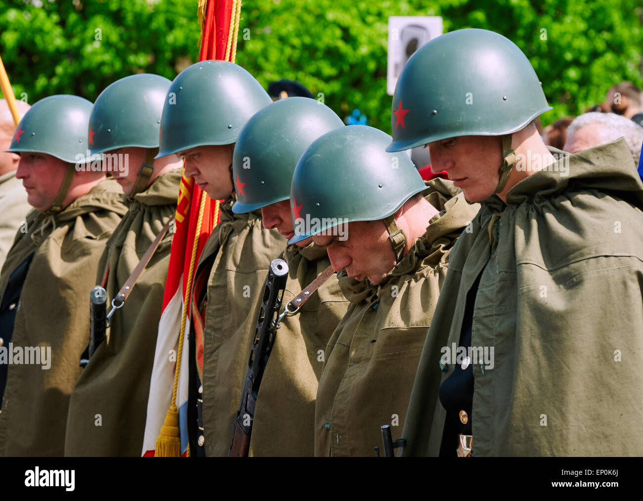 Celebrating the 70th anniversary of the Victory Day (WWII), Soviet soldiers in helmets and cloaks Stock Photo