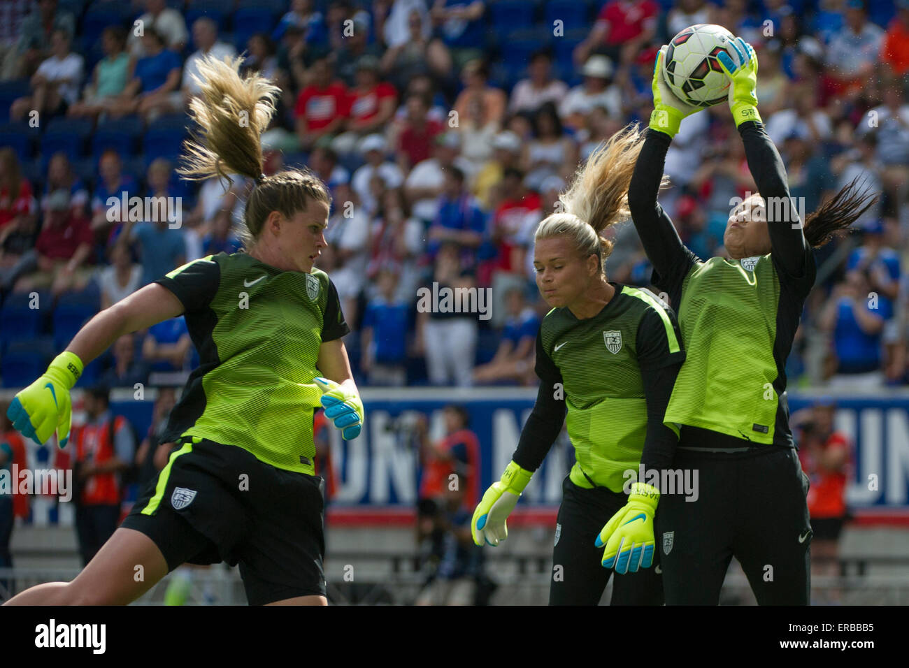 May 30, 2015: USA Women's National Team goalkeeper Hope Solo (1), USA Women's National Team goalkeeper Ashlyn Harris (18) and USA Women's National Team goalkeeper Alyssa Naeher (21) all react to the ball as they warm up during the United States Womens vs. Korea Republic- International Friendly at Redbull Arena in Harrison, NJ. The US Women's National Team played The Korea Republic to a 0-0 draw. (Mandatory Credit: Kostas Lymperopoulos/Cal Sport Media Stock Photo