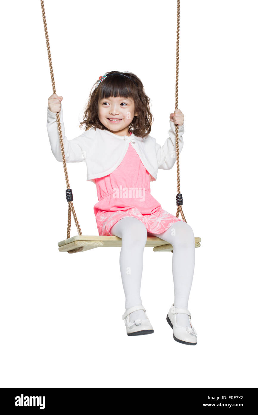 Cute little girl on swing Stock Photo