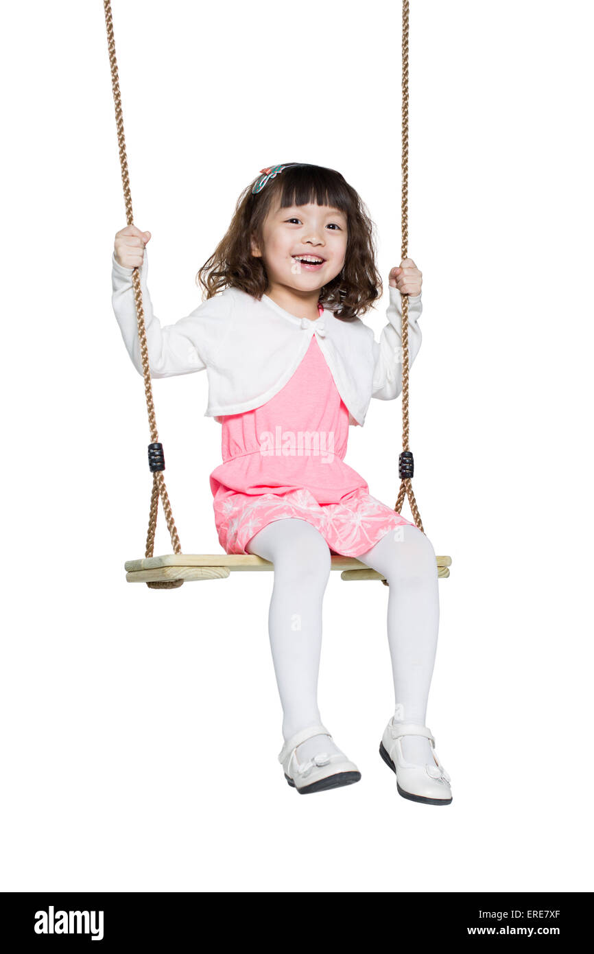 Cute little girl on swing Stock Photo