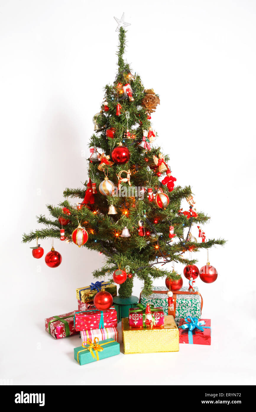 Decorated Christmas tree with gift boxes in Christmas festival Stock Photo