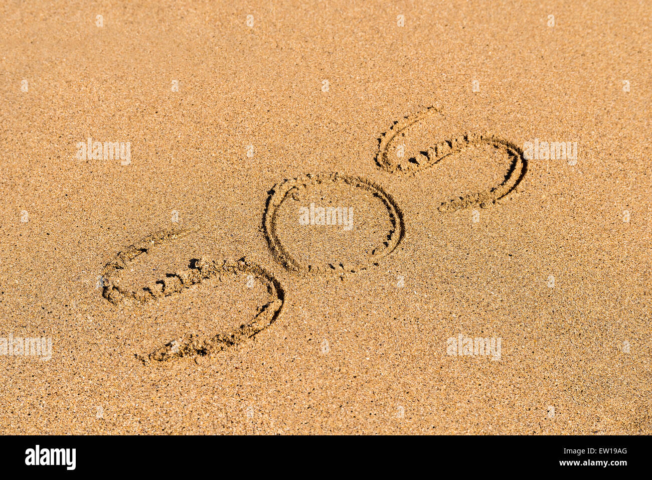 Help Sign Drawn On Beach Sand Stock Photo