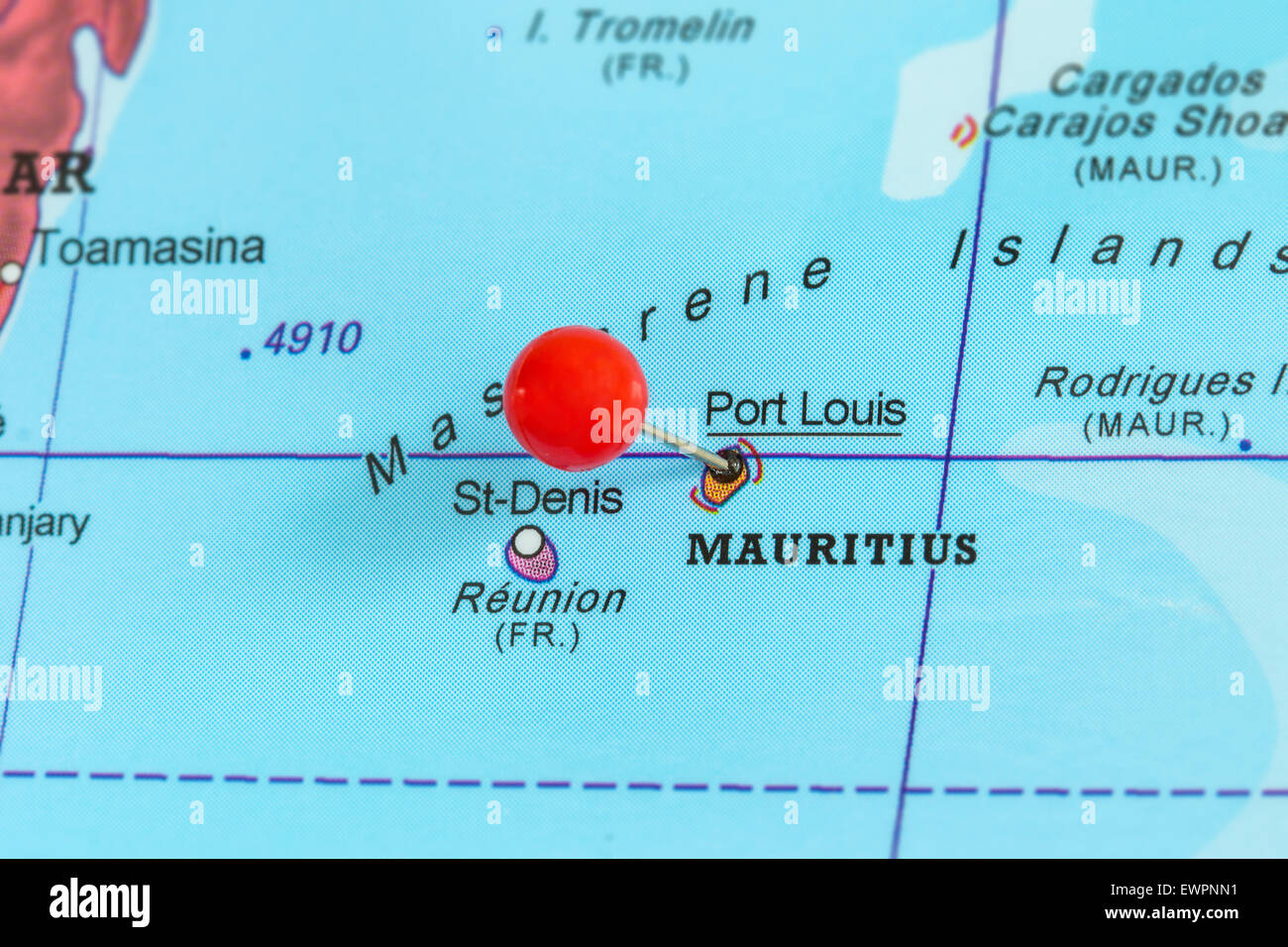 Close-up of a red pushpin on a map of Port Louis, Mauritius Stock Photo