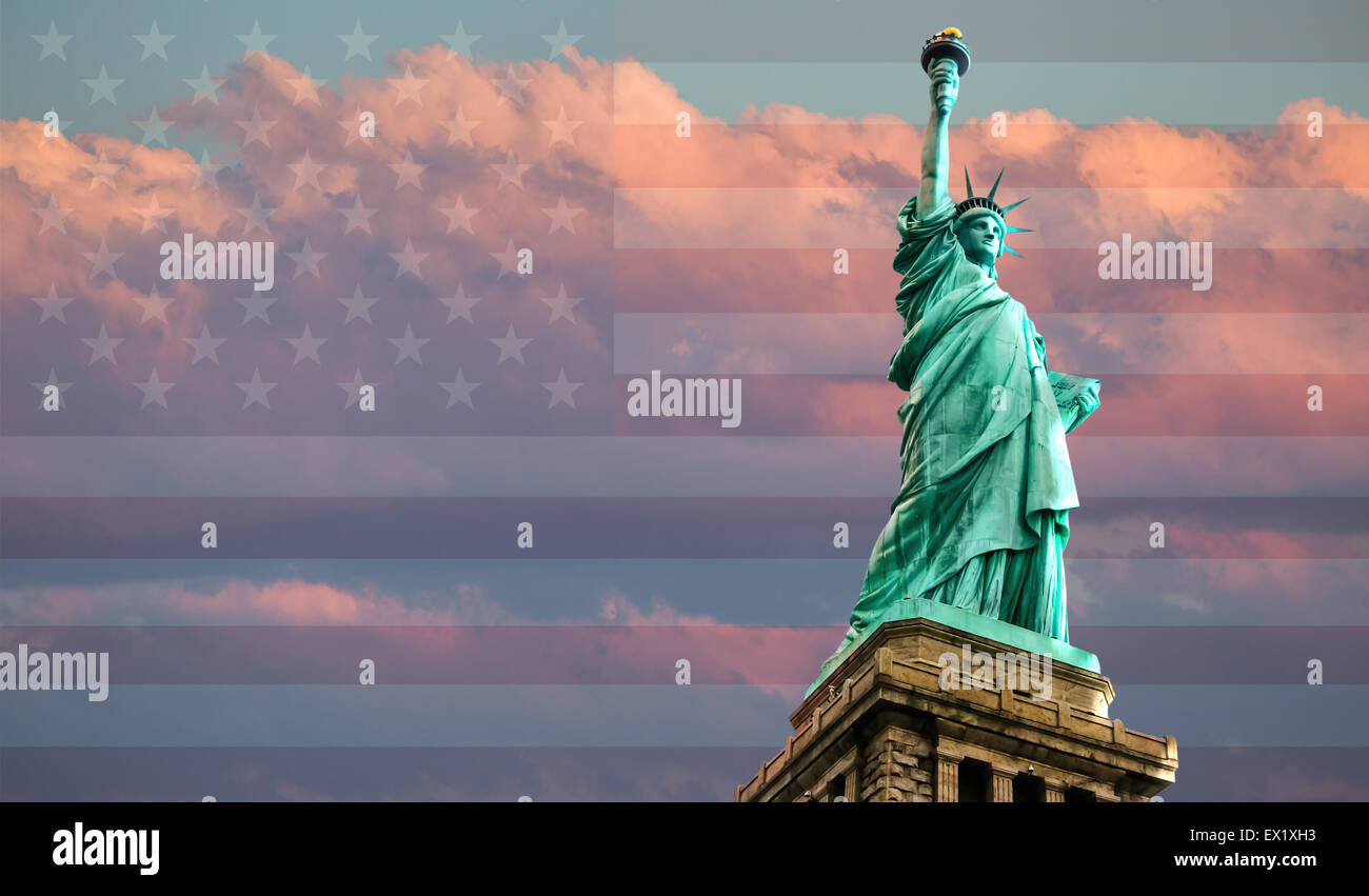 Statue of Liberty on American flag background against a cloudy sky at sunset, New York, USA Stock Photo