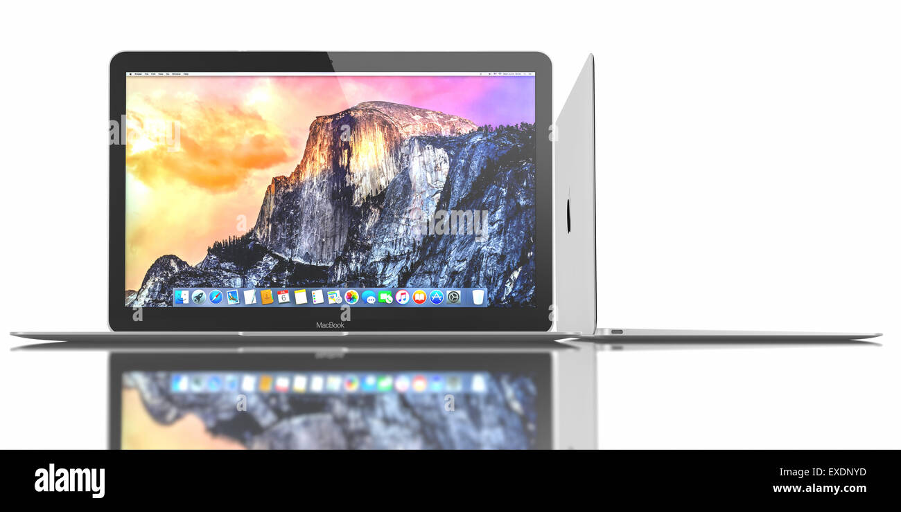 New Silver MacBook displaying OS X Yosemite. It has a 12-inch Retina display with a resolution of 2304 x 1440. Stock Photo