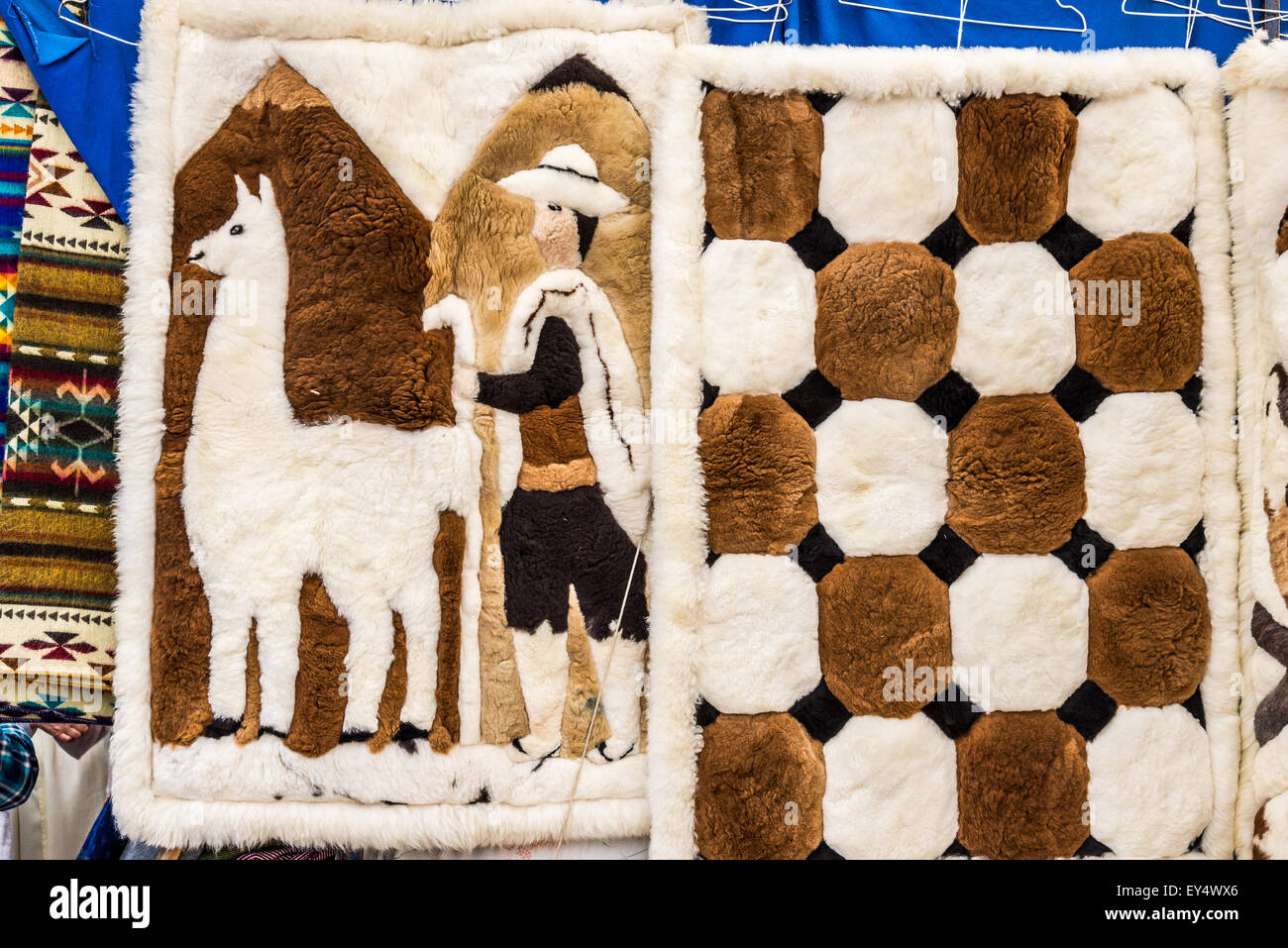 Andes scene rug for sale at local market. Otavalo, Ecuador. Stock Photo