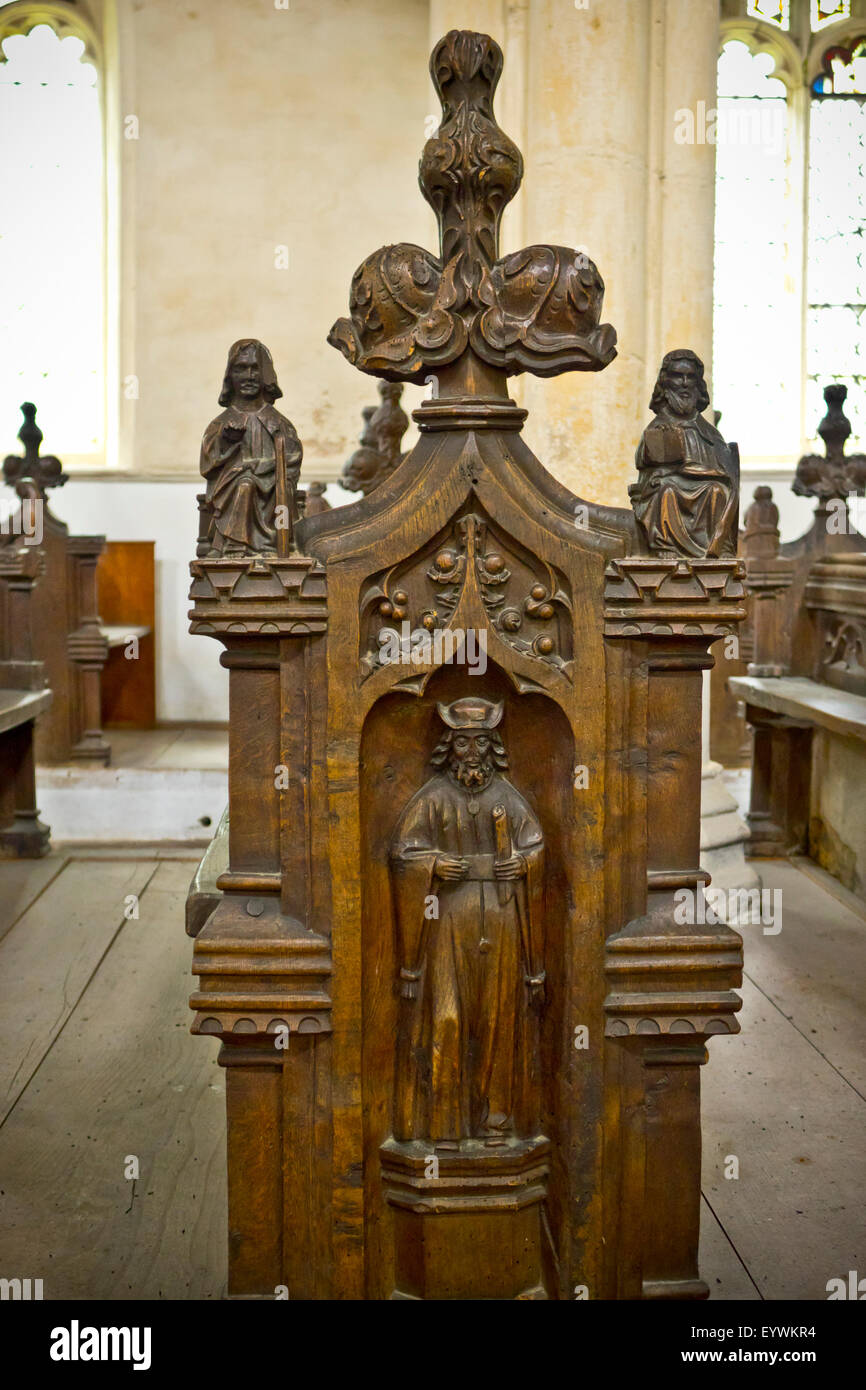 Carved wooden church pews Stock Photo