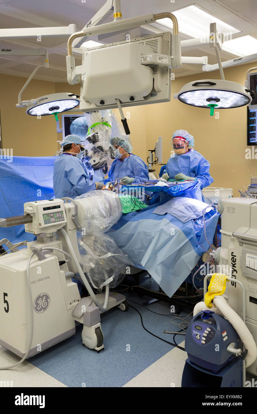 Englewood, Colorado - Dr. Paul Elliott performs minimally invasive lumbar spine surgery on a patient at Swedish Medical Center. Stock Photo