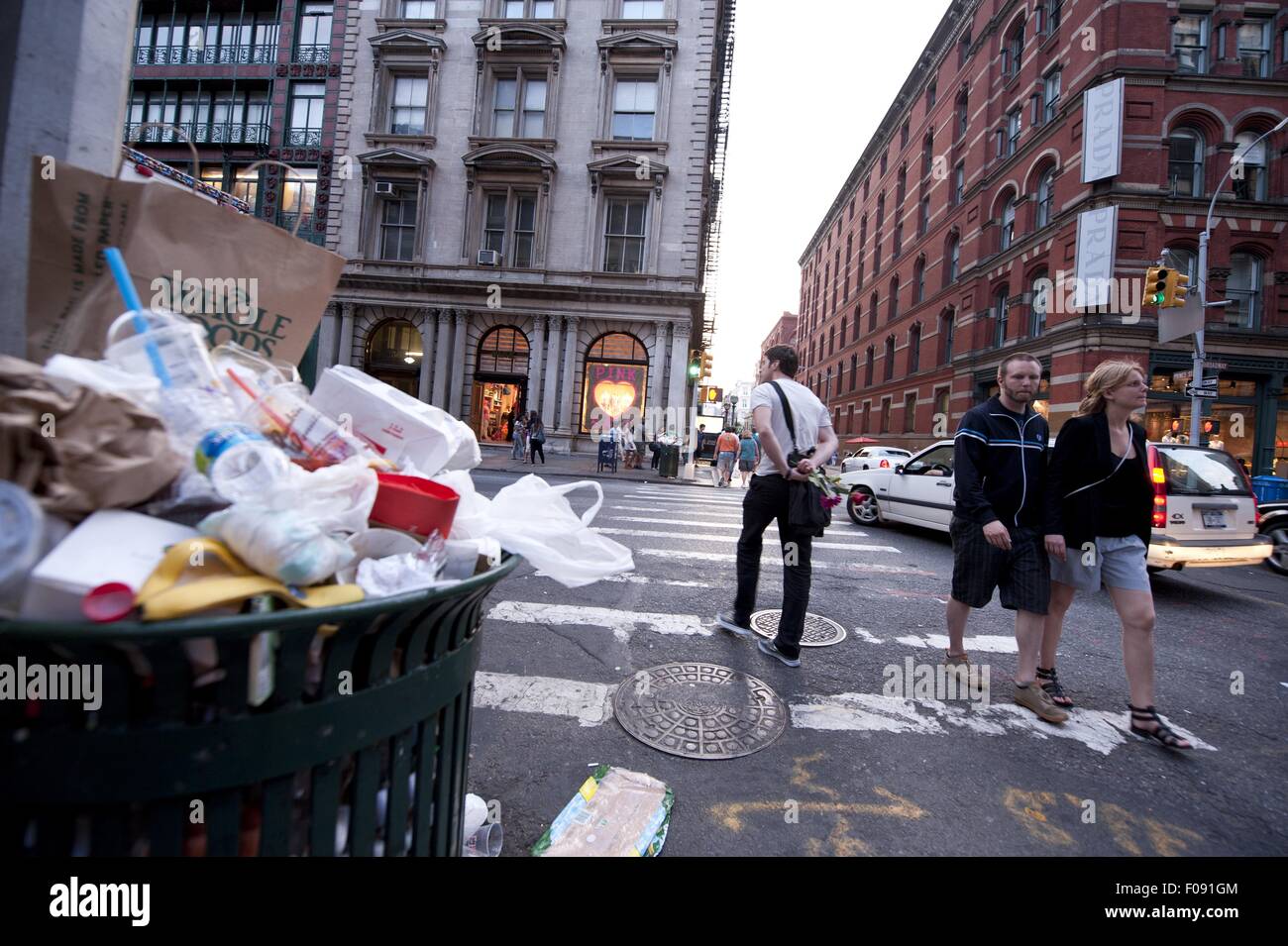 People walking across zebra crossing in SoHo, Manhattan, New York, USA Stock Photo