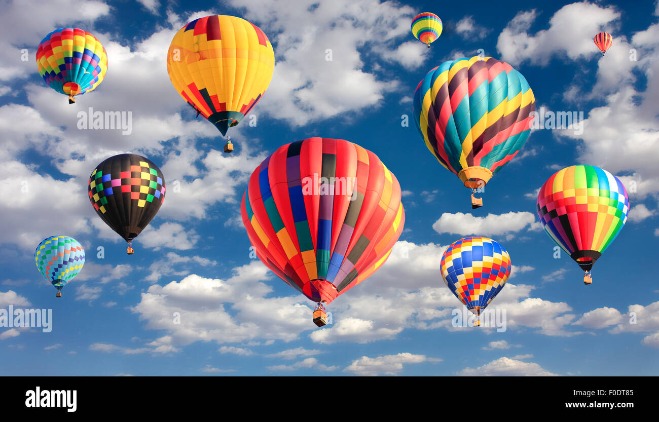 Multicolored hot air balloons flying Stock Photo