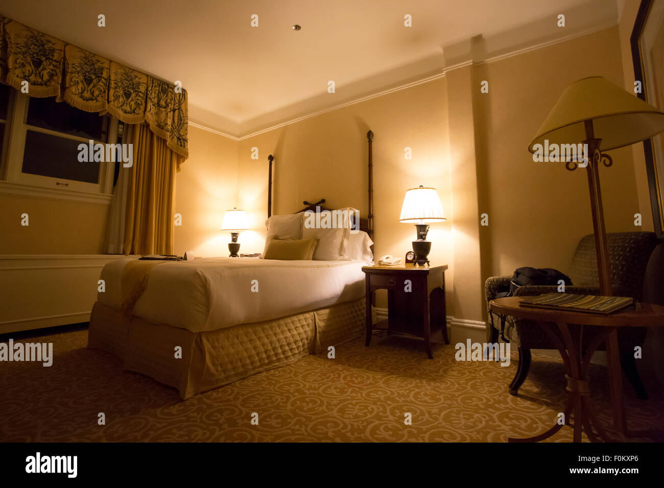 Interior of the bedroom at the Fairmont Hotel in San Francisco at night in 2012. Stock Photo