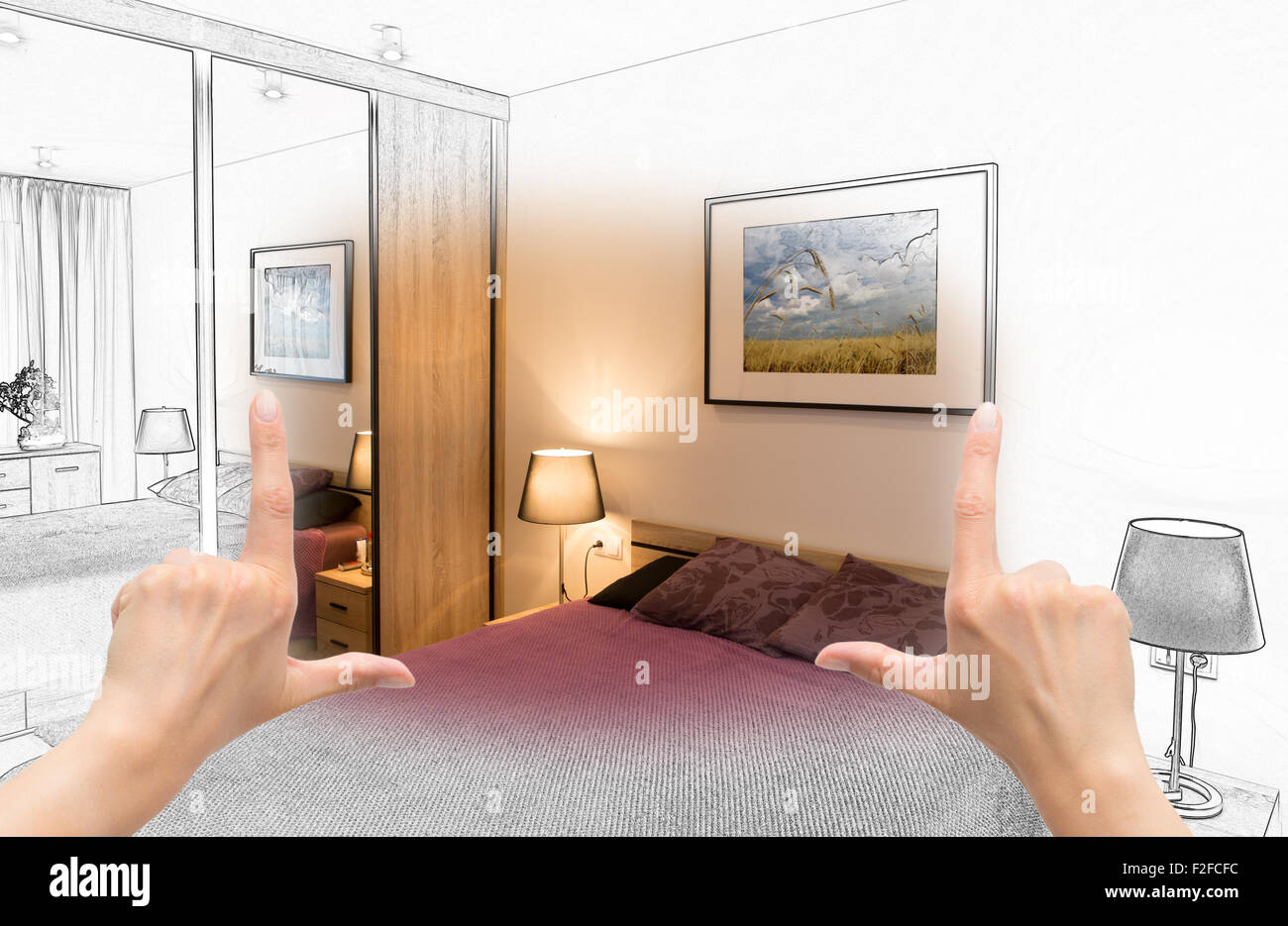 Female hands framing custom bedroom design. Combination drawing and photo. Stock Photo