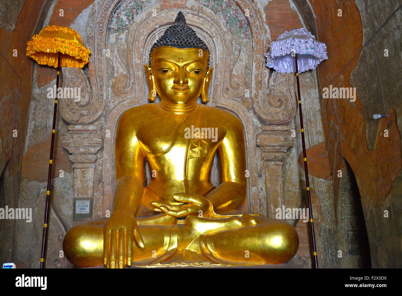 Exquisite gold Buddha at Ananda Temple the most revered by Burmese Buddhists in Bagan, Myanmar (Burma), Asia Stock Photo