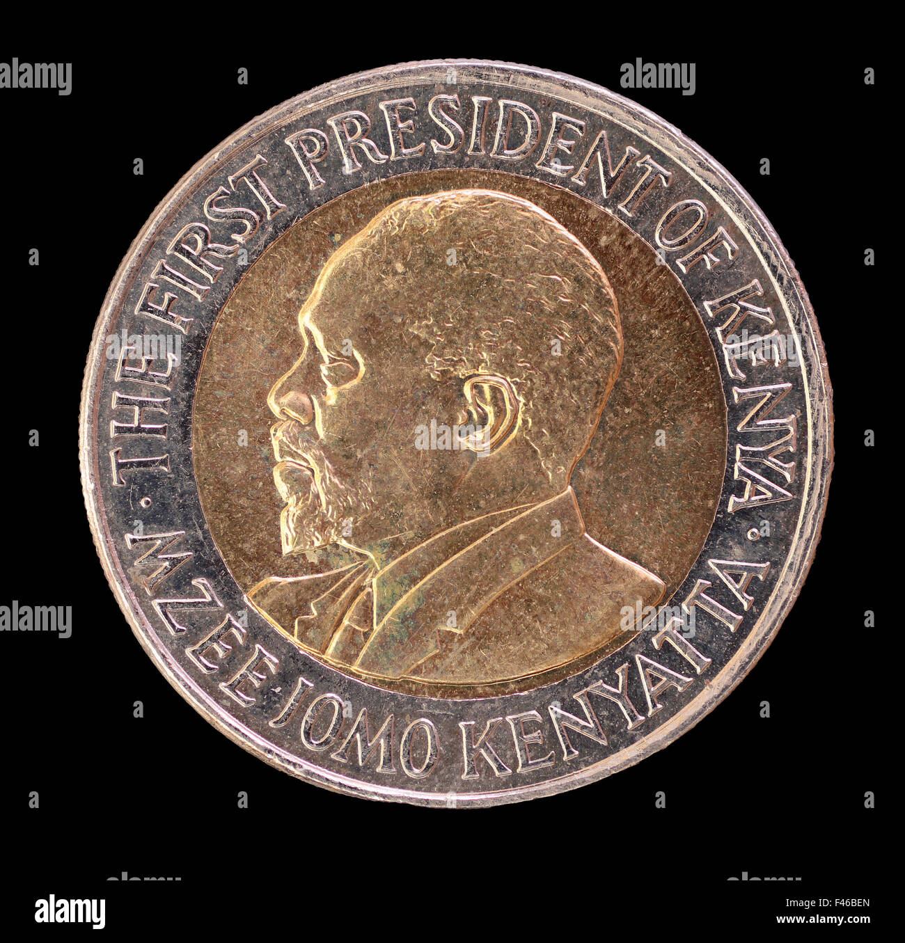 The head face of a 20 shilling coin, issued by the Republic of Kenya in 2005, depicting the portrait of the First President Mzee Stock Photo