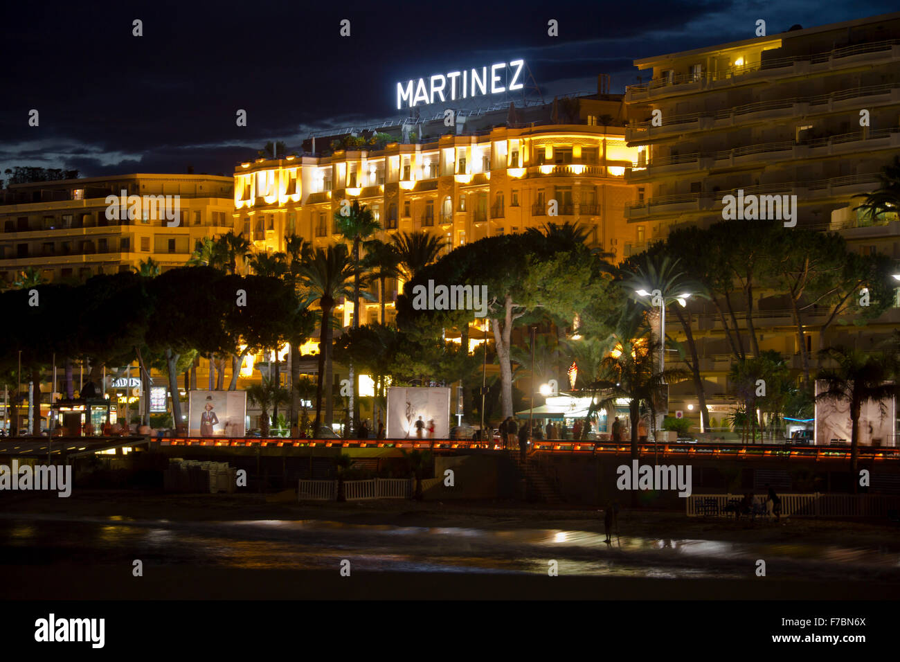 The beach promenade of Cannes at night Stock Photo