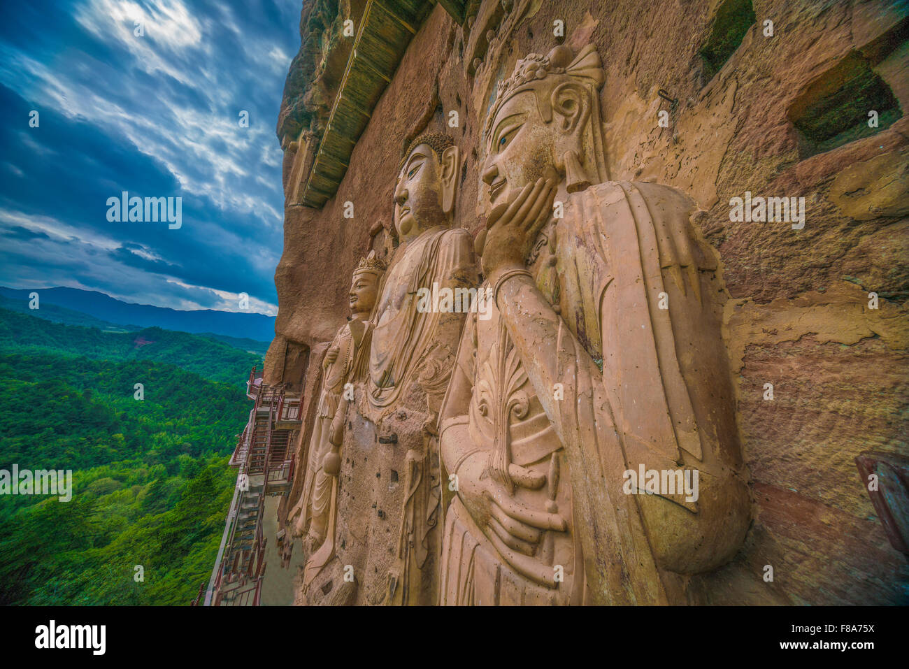 Huge Buddha statues, Maijishan Mountain Grottes,  Gansu Province, China  Dating from 5th Century Stock Photo