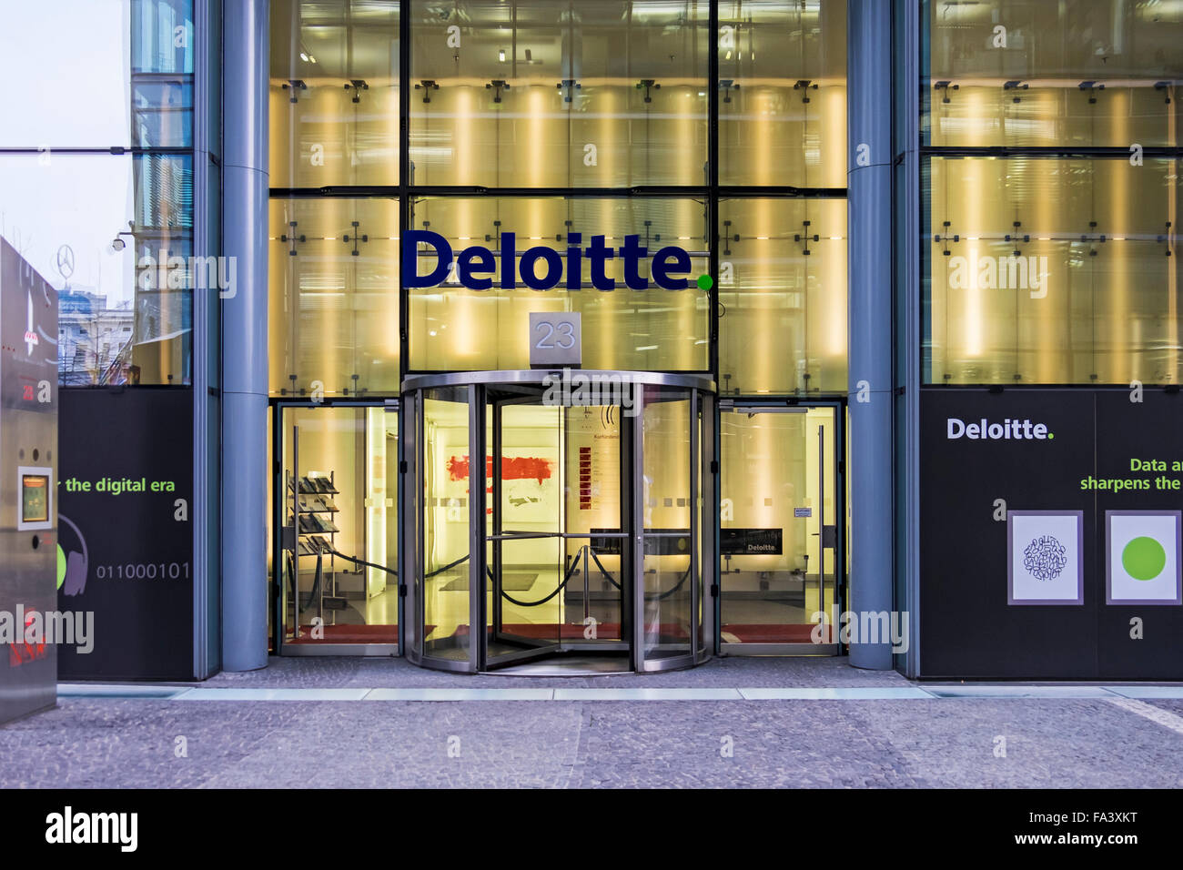 Deloitte accountants office exterior at the Neues Kranzler Eck modern shopping centre, Berlin Stock Photo