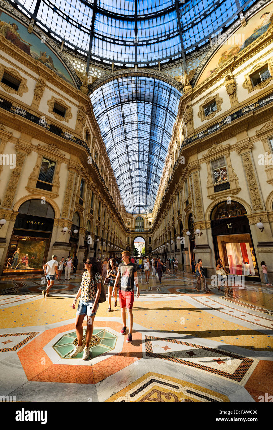 MILAN, ITALY - AUGUST 29, 2015: Luxury Store in Galleria Vittorio Emanuele II shopping mall in Milan, with tasted Italian restau Stock Photo