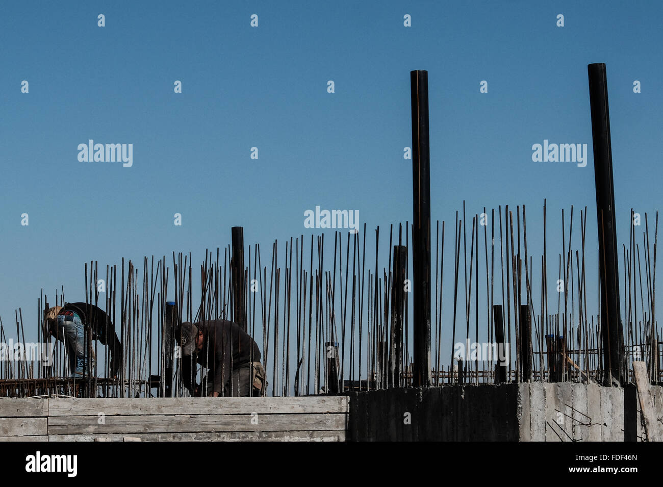 Maale Adumim, Israel. 31st January, 2016. Construction workers labor on ...