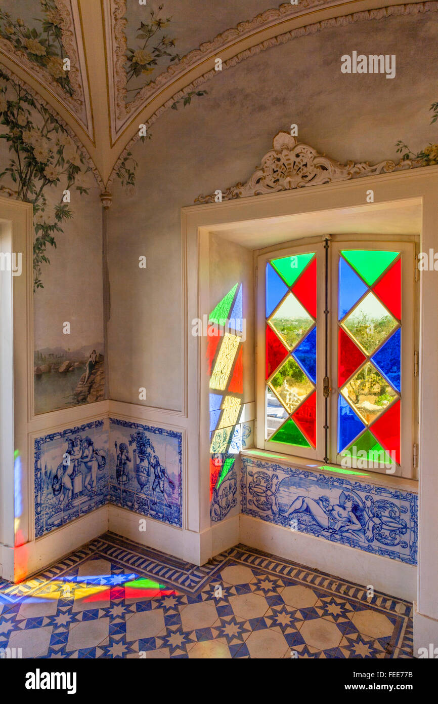 Portugal, Algarve, Faro, stained glass windows and azulejos tiles in the garden pavillion of the baroque gardens Stock Photo