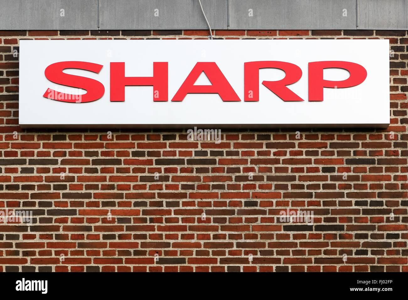 Sharp logo on a facade Stock Photo