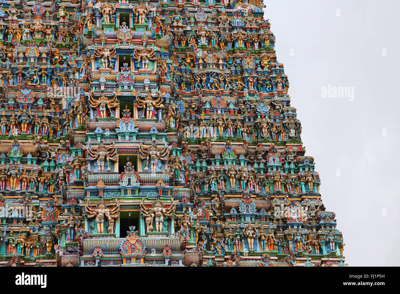 Outside wall / Gopuram of the Hindu Sri Meenakshi temple, Madurai , Tamil Nadu , India Stock Photo