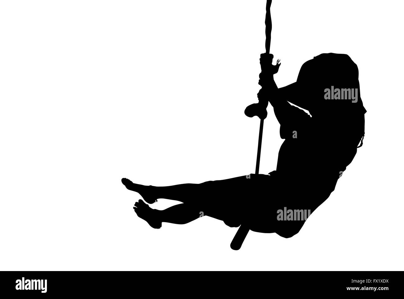 Woman  silhouette swinging Stock Photo