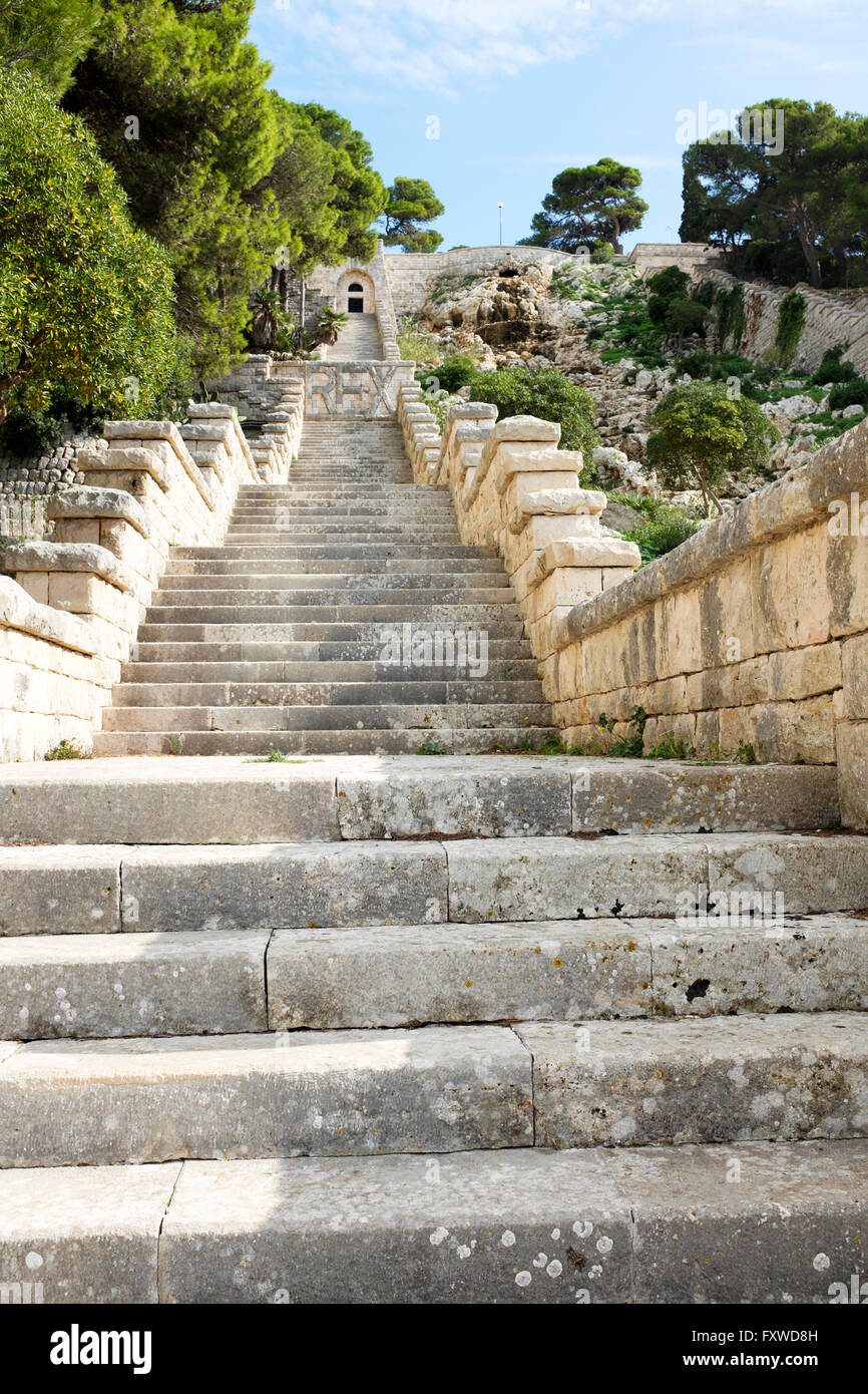 The final stage of the Puglia aqueduct is a man-made waterfall that ends in Santa Maria di Leuca flanked by two stone staircases Stock Photo