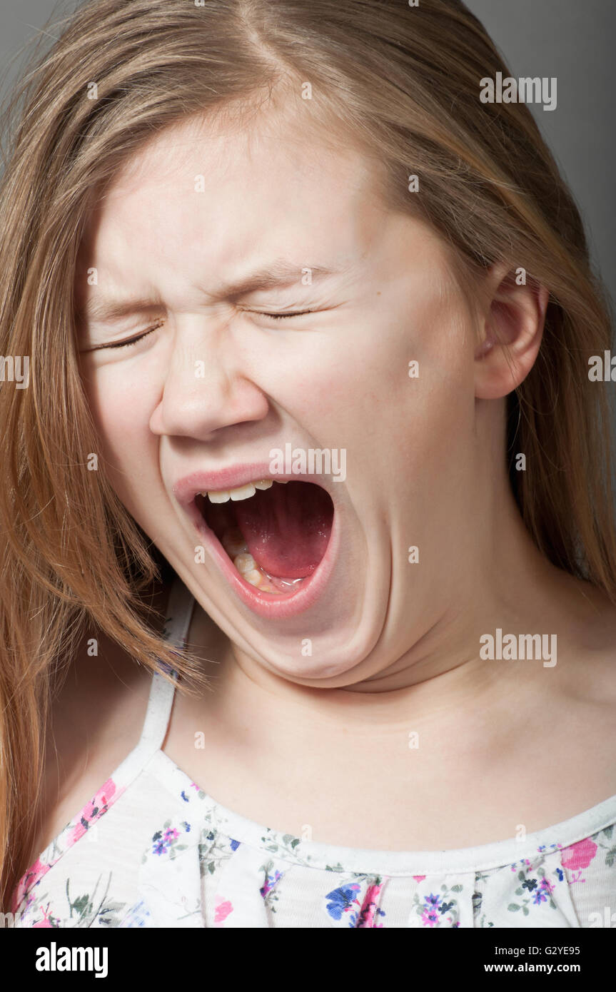 Child yawning Stock Photo