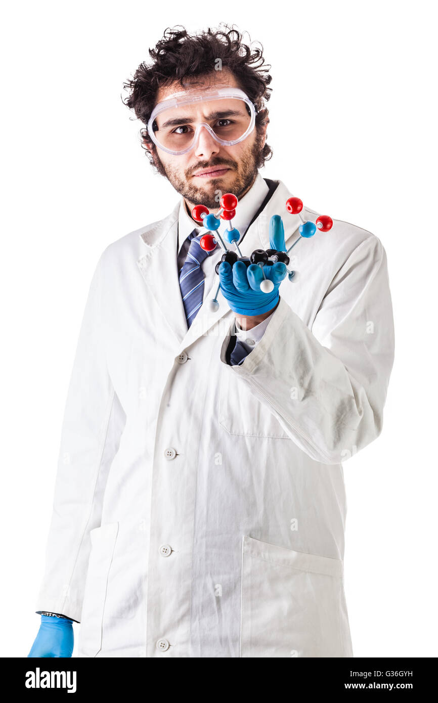 a doctor or researcher with a white lab coat holding a trinitrotoluene tnt molecular model isolated over white Stock Photo