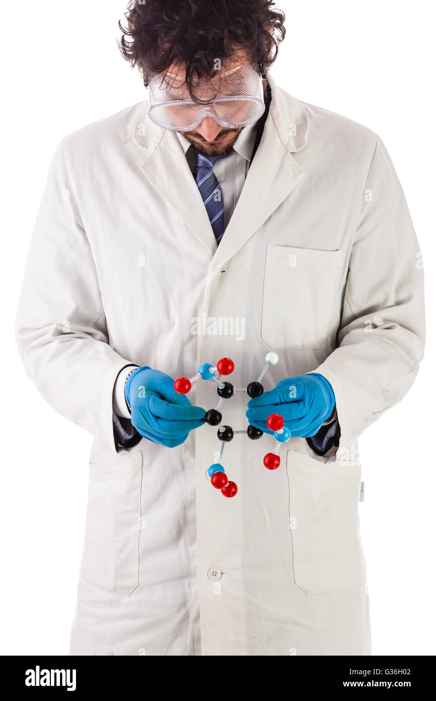 a doctor or researcher with a white lab coat holding a trinitrotoluene tnt molecular model isolated over white Stock Photo