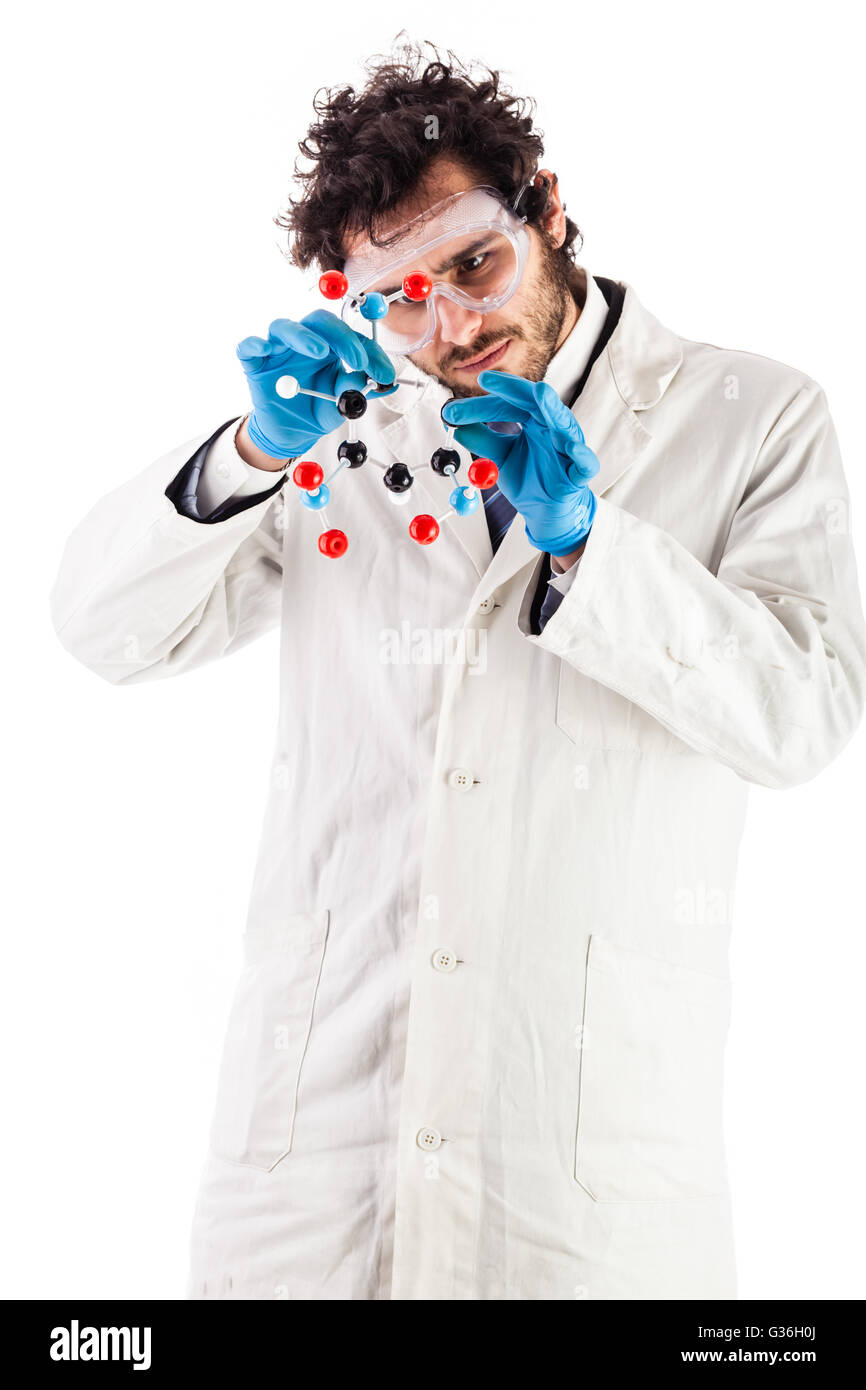 a doctor or researcher with a white lab coat holding a trinitrotoluene tnt molecular model isolated over white Stock Photo