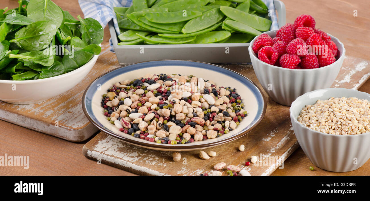 High Fiber Foods on wooden board. Selective focus Stock Photo