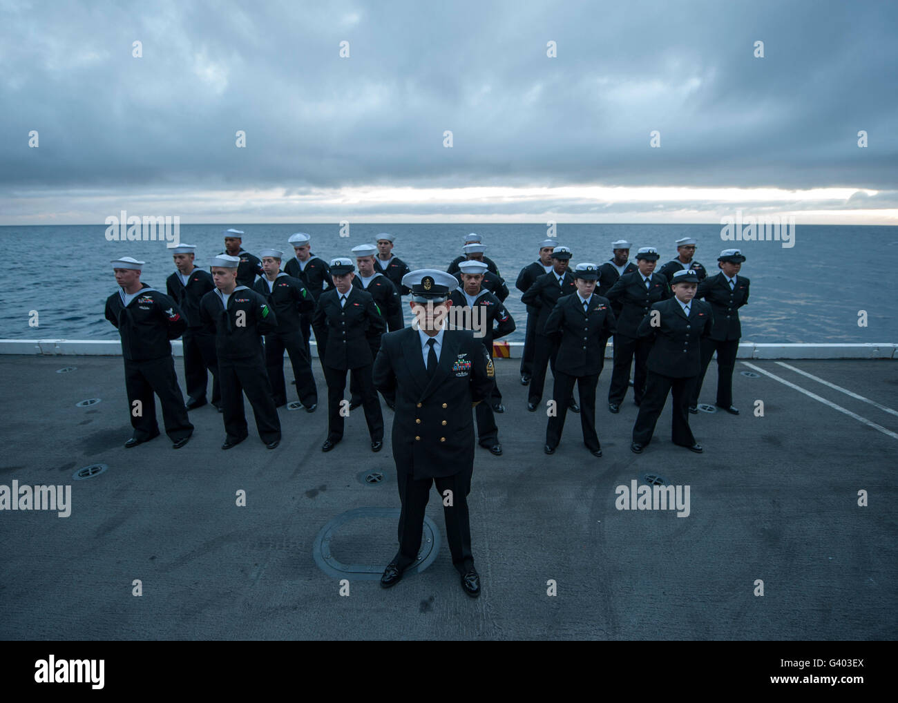 The burial detail from the USS Carl Vinson stands at parade rest. Stock Photo