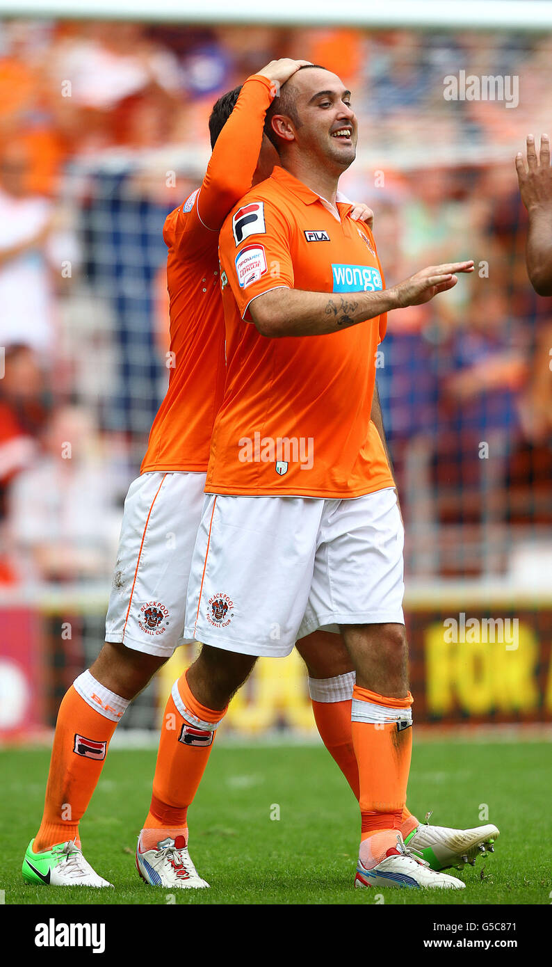 Blackpool's Gary Taylor-Fletcher celebrates his goal against Ipswich Town with team mate Neal Eardley during the npower Football League Championship match at Bloomfield Road, Blackpool. Stock Photo