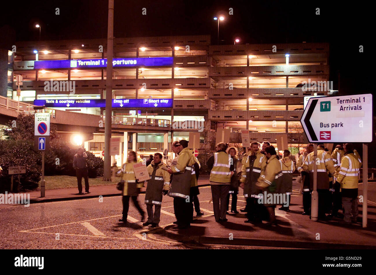 Security staff at Manchester Airport man a TGWU picket line outside the airport's Terminal One, to protest against plans to axe hundreds of jobs. The workers at the country's third biggest airport were beginning a series of walkouts. * ... as rising industrial unrest was set to further strain relations between the Government and trade unions. Stock Photo