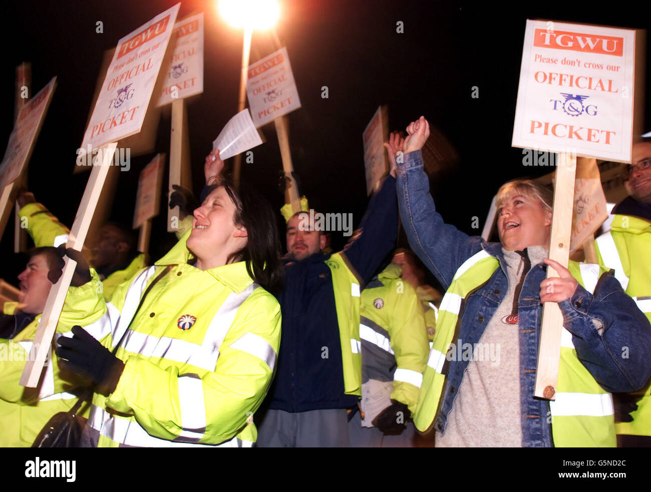 Security staff at Manchester Airport man a TGWU picket line outside the airport's Terminal One, to protest against plans to axe hundreds of jobs. The workers at the country's third biggest airport were beginning a series of walkouts. * ... as rising industrial unrest was set to further strain relations between the Government and trade unions. Stock Photo