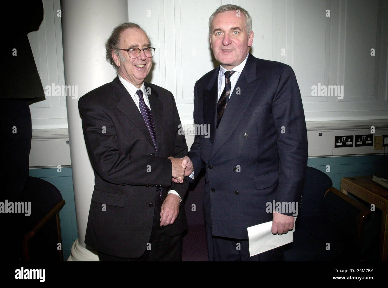 Irish Prime Minister Bertie Ahern meets Judge Henry Barron at Government Buildings, before the release of the Barron Report on the 1974 Dublin and Monaghan bombings which claimed 34 lives. Mr Ahern was also meeting the families of some of those killed in the bombings and, in a goodwill gesture, the Taoiseach will meet the executive committee of the Justice for the Forgotten group, and its legal team. Stock Photo