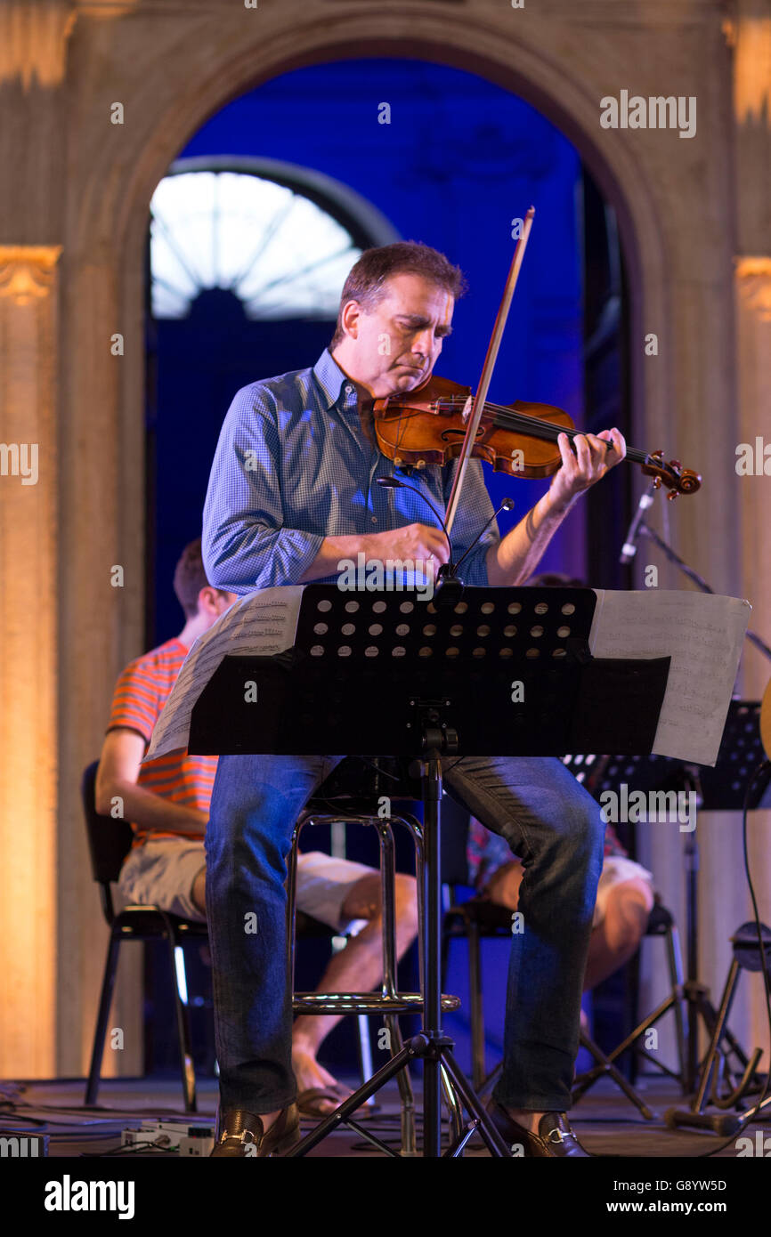 Rome, Italy. 30th June, 2016. Rome, Palazzo Barberini - Soundcheck for Mike Mills (R.E.M.), guitar, and Robert McDuffie, violin: Concerto for Rock Band,Violin, and String Quintet in Rome Chamber Music Festival 2016 Credit:  Red On/Alamy Live News Stock Photo