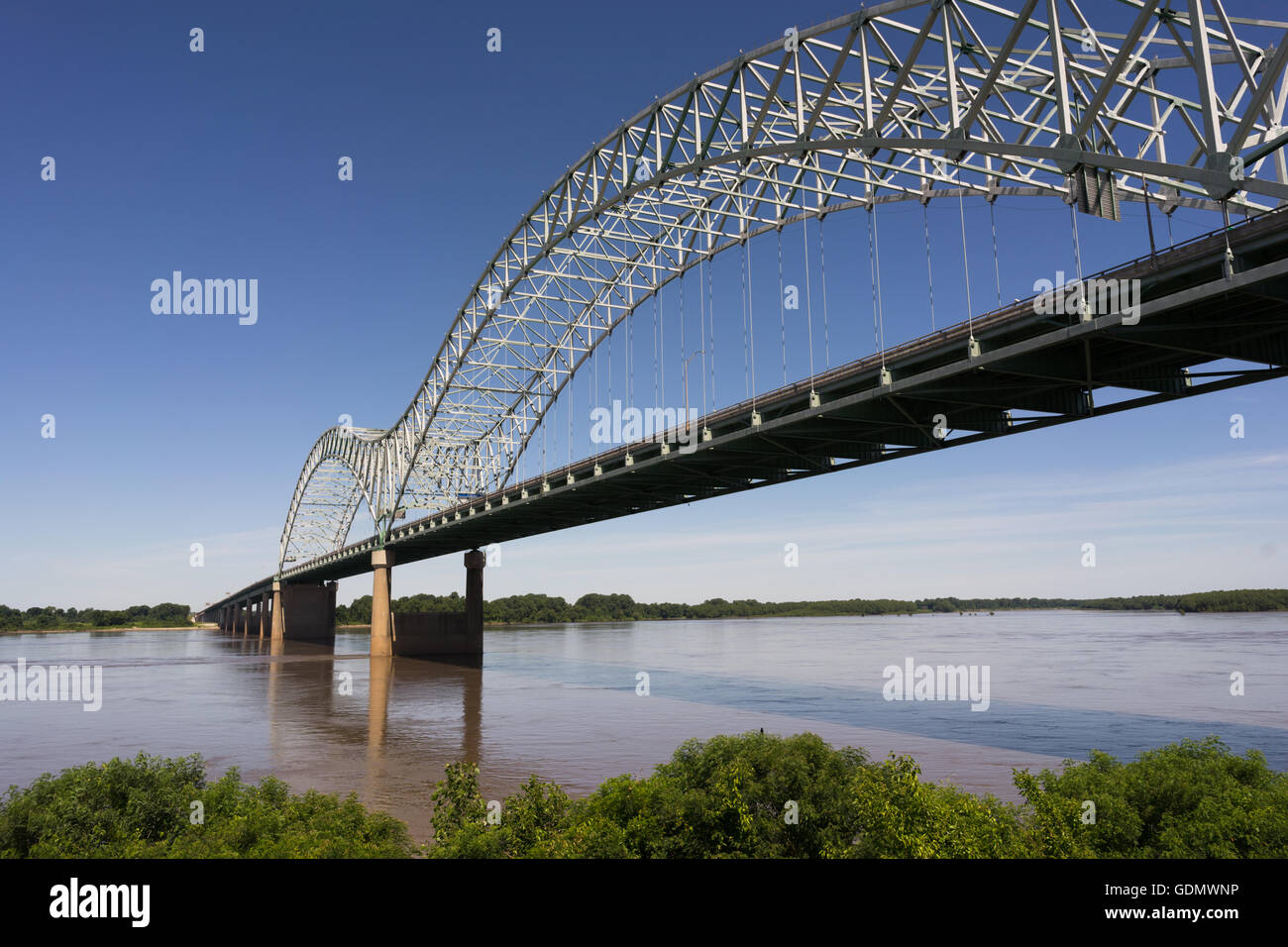 The Mississippi River flows under the Hernando de Soto Bridge looking towards Arkansas Stock Photo