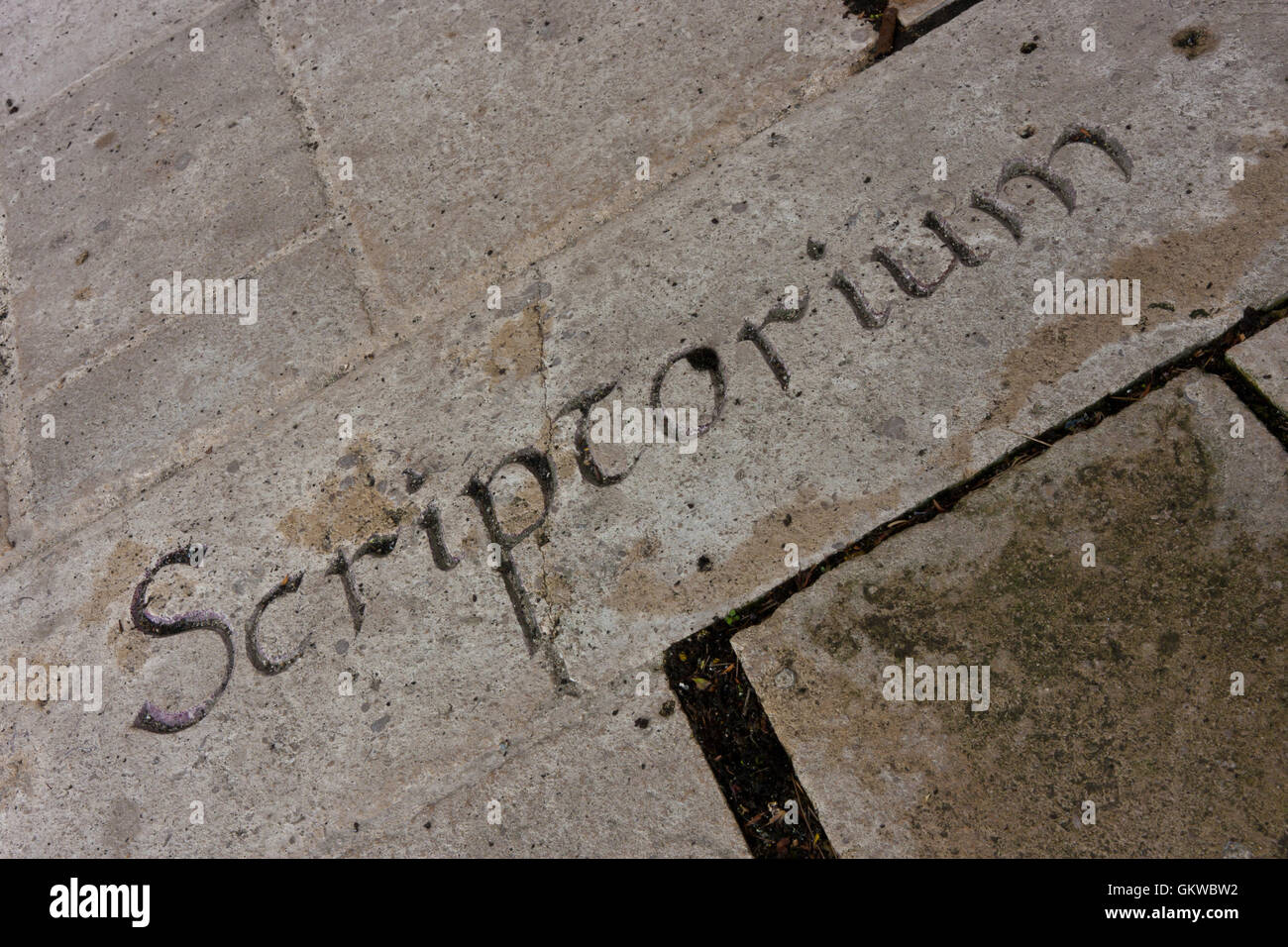 Letters on a stone wall Stock Photo