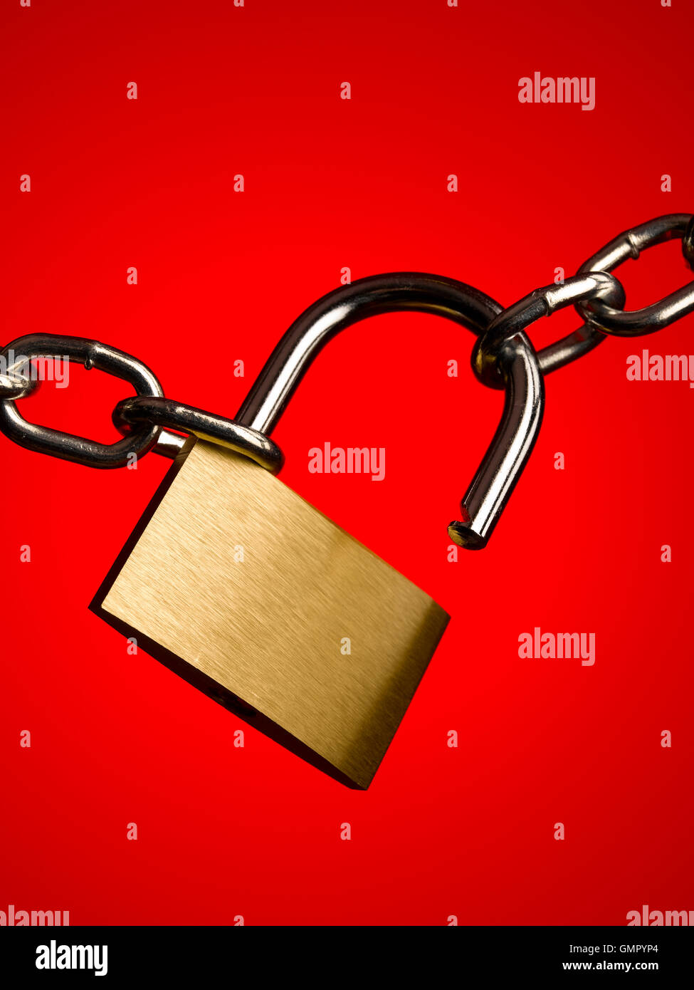 Padlock and chain on red Stock Photo